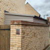 Bespoke Between House and Wall